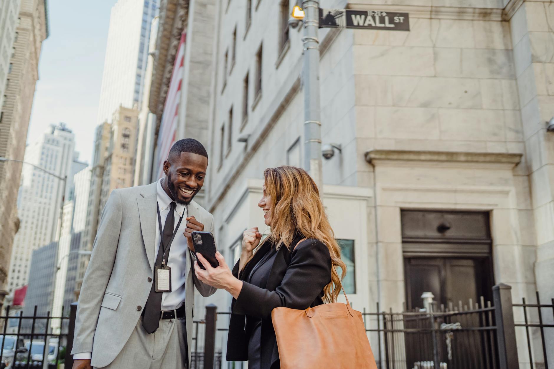 woman and man looking at cellphone
