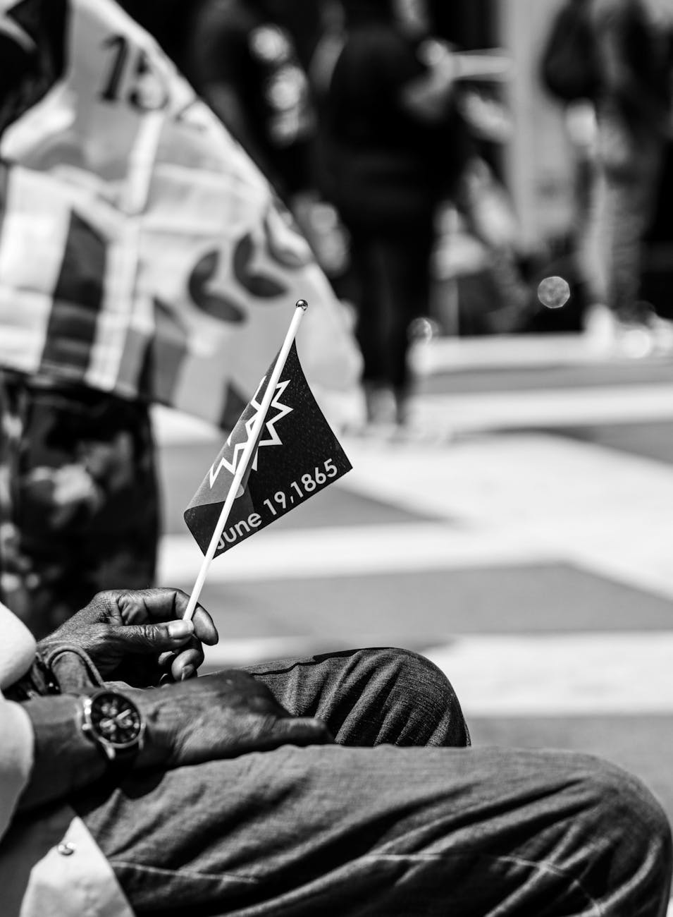 man hands holding civil war memory flag